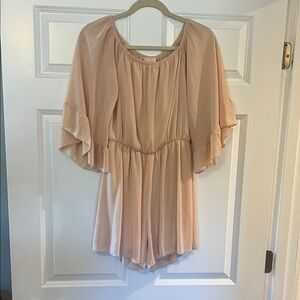 Chic Blush Ruffle Sleeve Romper